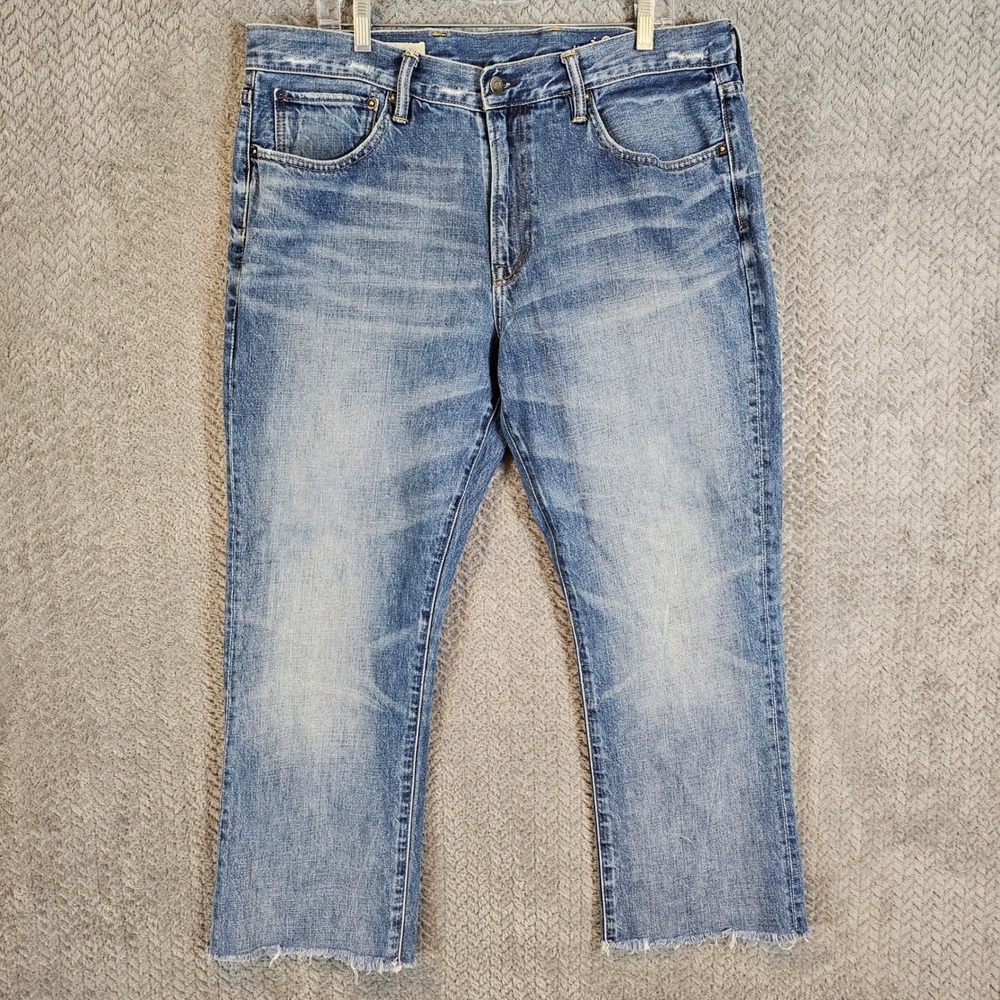 Gap 1969 Mens Bootcut Jeans 38x32 Medium Wash Ringspun Denim Raw Hem Distressed